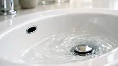 Why your bathroom sink has a small hole near the top and why it matters